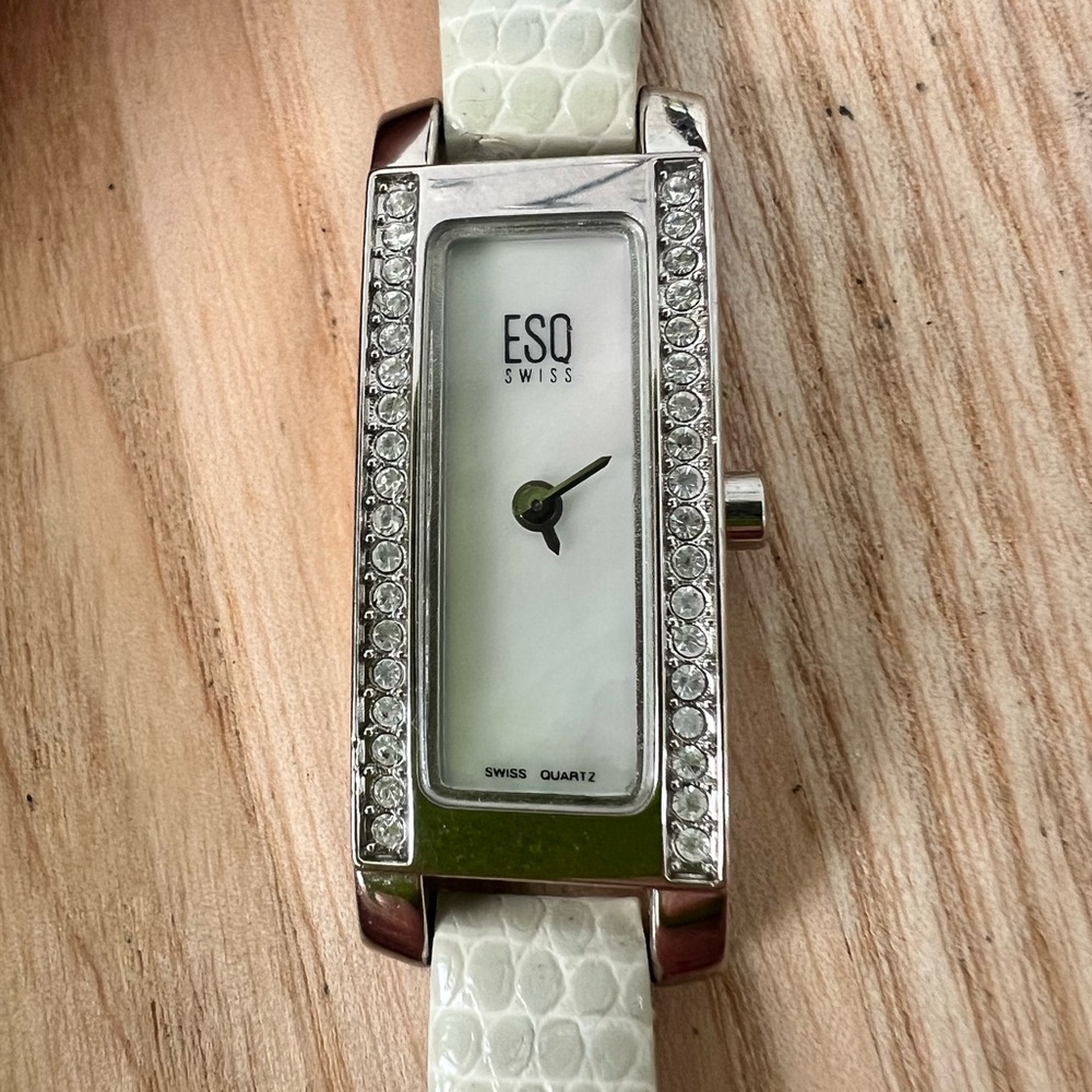 ESQ by Movado ladies skinny silver tone rectangular dress watch NEW BATTERY
